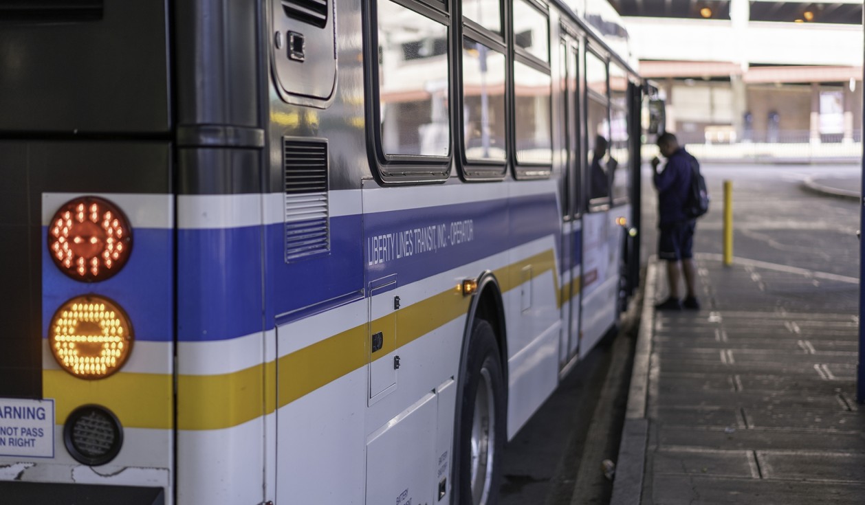 The Bee-Line System Liberty Lines bus picking up passenger at the New York bus stop in Westchester County