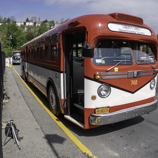 Liberty Lines bus parked in parking lot